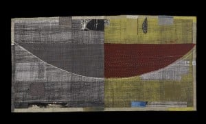 Textile artwork by Dorothy Caldwell. Multiple hand dyed fabric pieces hand sewn together. Series of grid lines and a large bowl like shape in grey and red-brown.