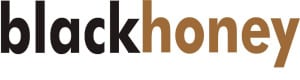 Blackhoney logo. Black and gold text.