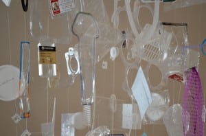 Mixed media installation by Beth McCubbin. Series of found plastic suspended in a cloud like shape.