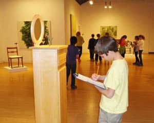 Child in a school group writes about a sculpture installed in AGP's main gallery