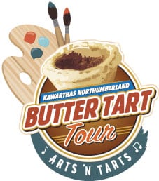 Kawarthas Northumberland Butter Tour logo. Butter tart with a paint palette and brushes graphic. Text reads: "Arts n' Tarts."