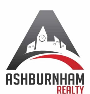 Ashburnham Realty logo. City scape graphic.