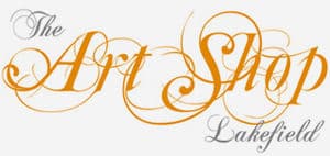 Lakefield's The Art Shop logo. Gold and black cursive text.