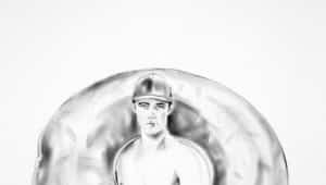 Cropped graphite drawing by Chris Ironside featuring a young man holding an inflatable swimming doughnut