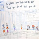 Marker, pencil, and pencil crayon drawing of a doctor, nurse, grocery store worker, police officer, fire fighter, paramedic, and waste removal worker with the text: "Merci pour tout que tu fait. Thank you for all that you do. We are all thankful for all of these people."