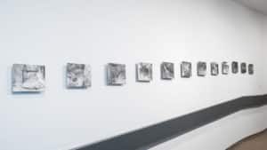 Gallery view of Sasha Opeiko's solo exhibition 217. Graphite drawings on gessoed aluminum installed on the AGP ramps.