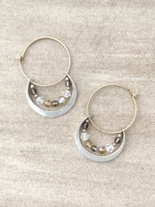 Sterling silver and 14 karat gold earrings with hammered texture and beads by Valerie Davidson