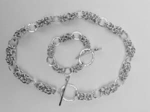 Handmade silver chain bracelet and necklace set with multiple interlocking links by Frances Timbers