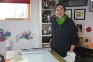 Connie van Rijn standing in her studio