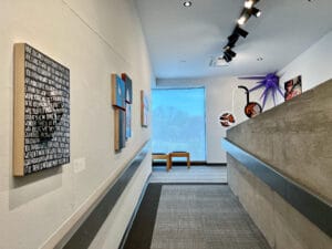 youth artworks presented in an art gallery